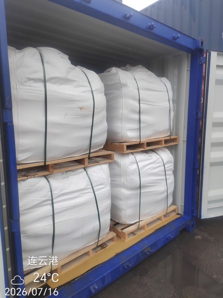Palletized jumbo bags of fused silica loaded into an export container